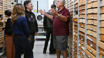 Jeff Smith, curator of the Bohart Museum's Lepidoptera collection, answers questions about moths that resemble bees. (Photo by Kathy Keatley Garvey)