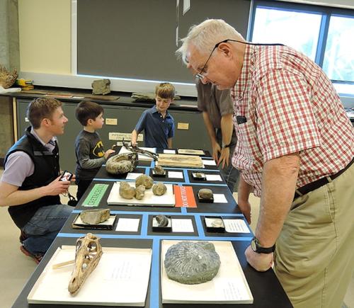 Visitors explore the paleontology display. (Photo by Kathy Keatley Garvey)