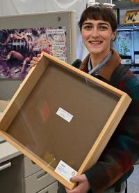 Brittany Kohler with a specimen drawer.