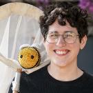 Microbial ecologist Danielle Rutkowski with insect net