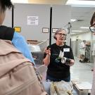 Entomologist and UC Davis doctoral alumna Fran Keller, professor at Folsom Lake College and a lecturer with the UC Davis Department of Entomology and Nematology, explaining collection techniques at the Bohart Museum of Entomology open house.  (Photo by Kathy Keatley Garvey)
