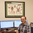 Professor Jason Bond pictured in his office in 2018, when he joined the UC Davis faculty. (Photo by Kathy Keatley Garvey)